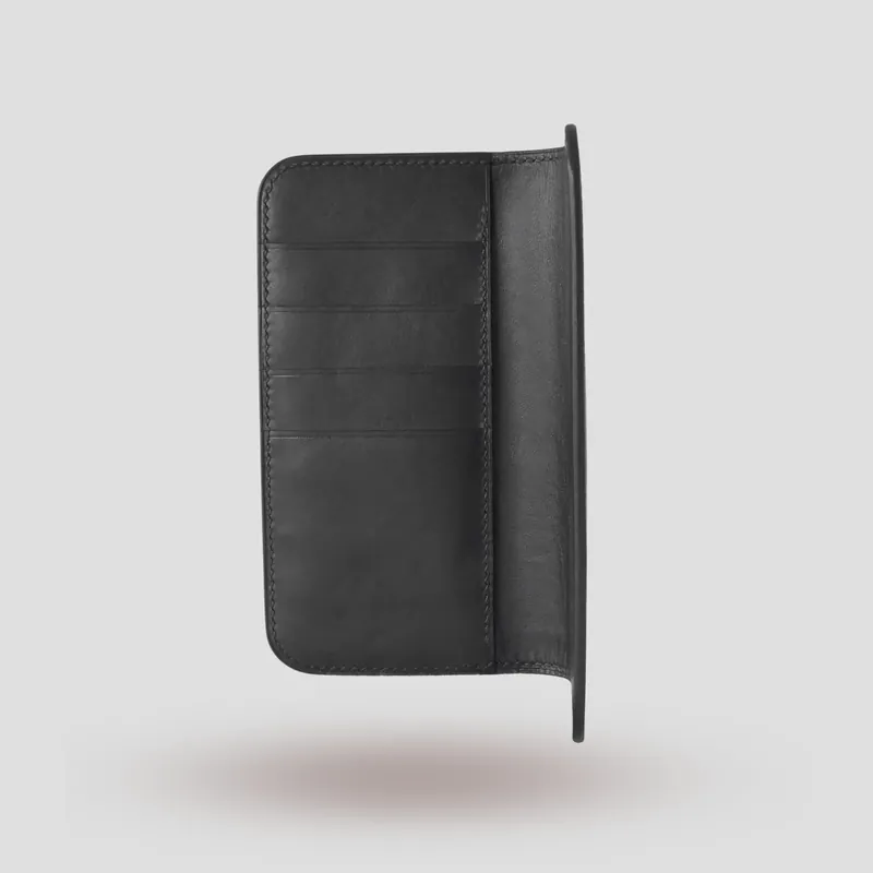 A custom iPhone Folio handcrafted in black premium Italian vegetable-tanned leather.