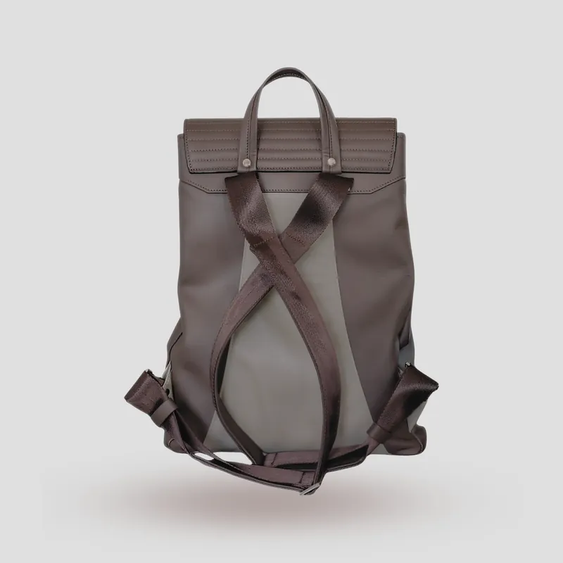 A custom backpack handcrafted in mocha and off-white premium cowhide leather.