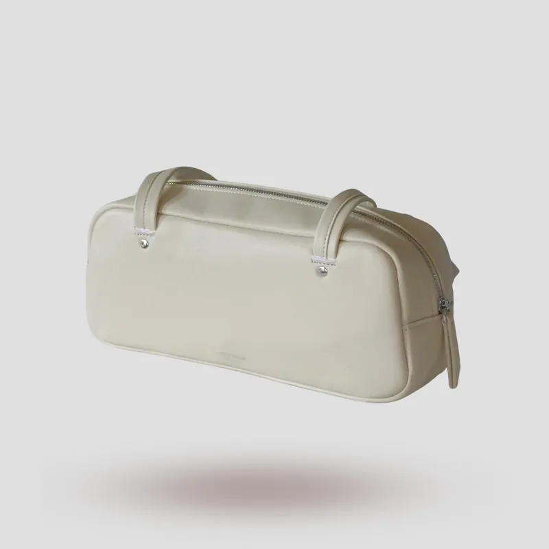 A custom shoulder bag handcrafted in off-white premium cowhide leather.
