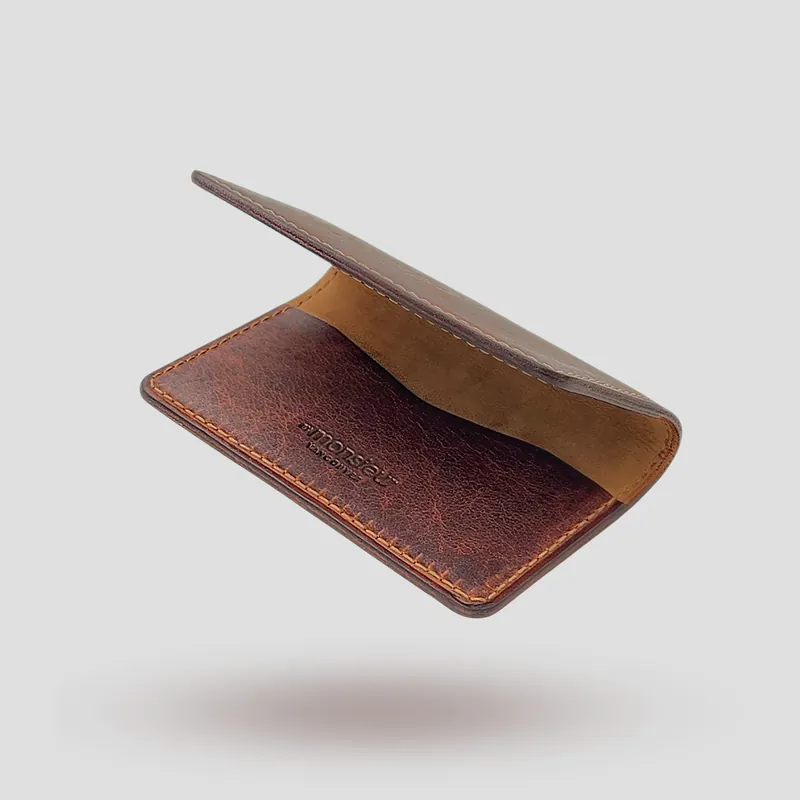 A custom cardholder handcrafted in brown premium cowhide leather.