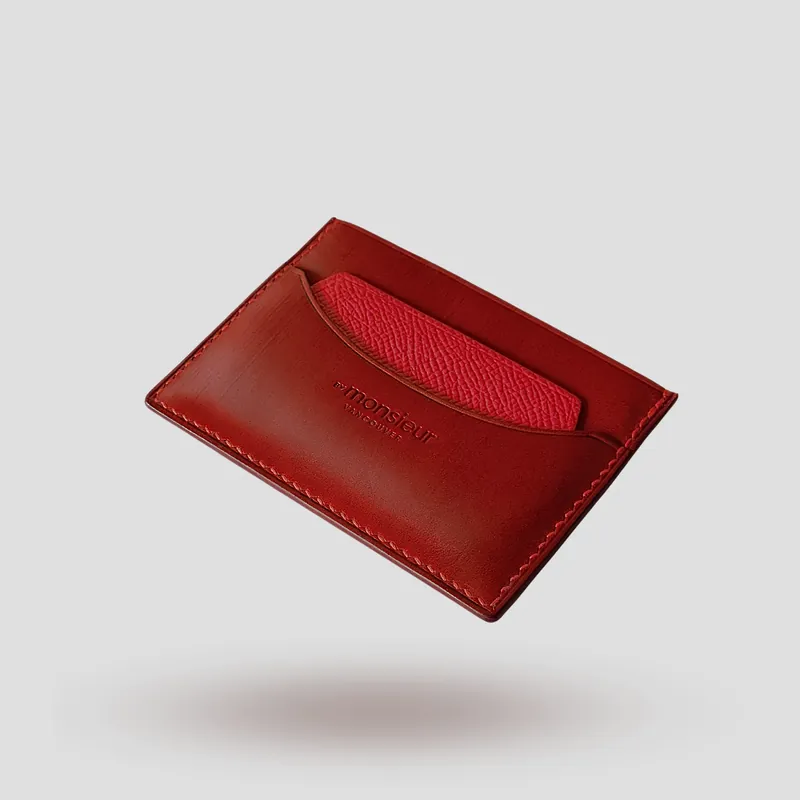 A custom cardholder handcrafted in red premium cowhide leather.
