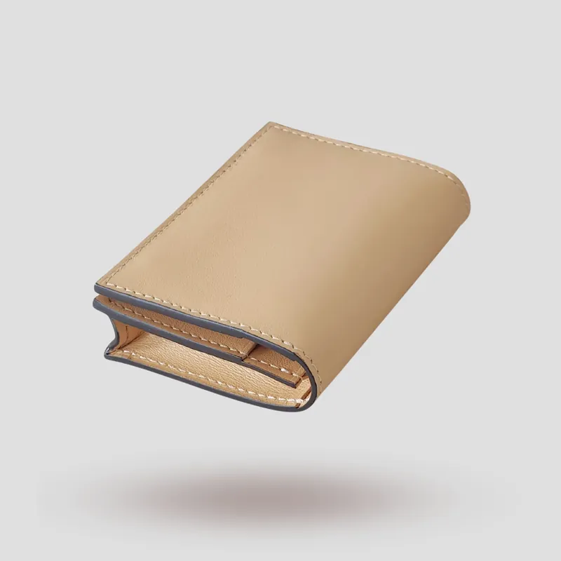 A custom wallet handcrafted in beige premium cowhide leather.