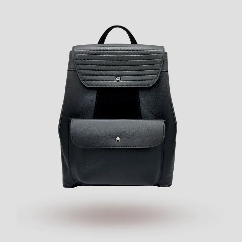 A custom backpack handcrafted in black premium cowhide leather and suede.
