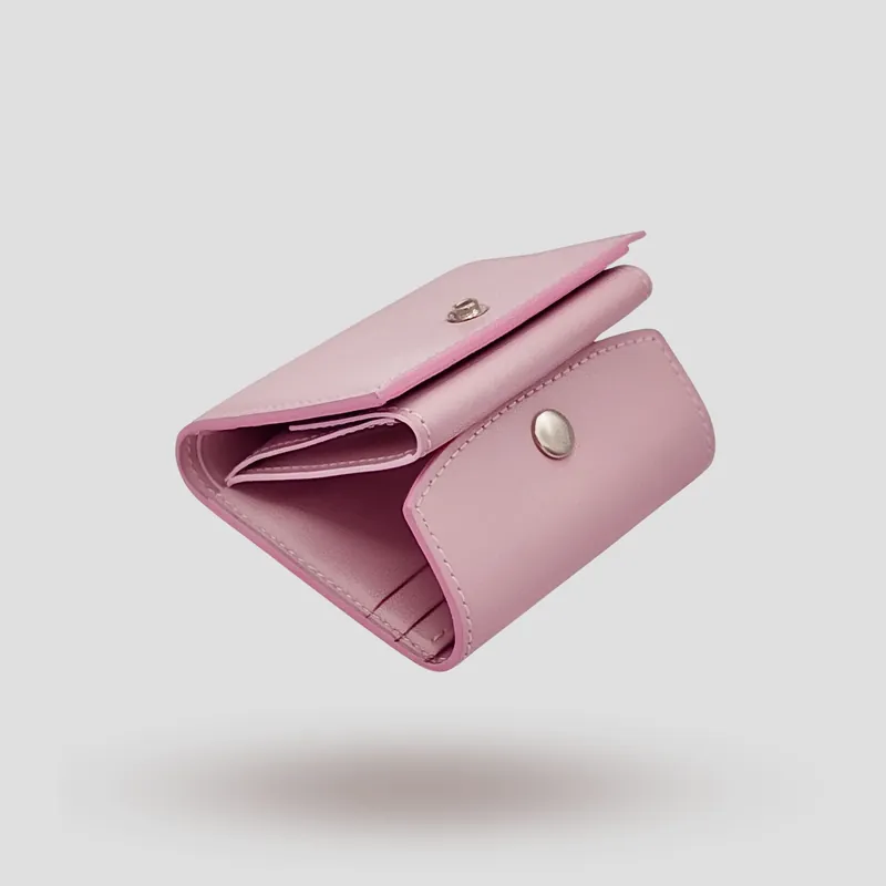 A custom wallet handcrafted in pink premium cowhide leather.