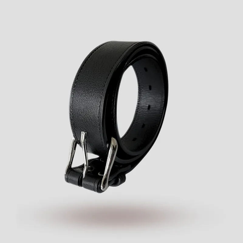 A custom belt handcrafted in black premium cowhide leather.