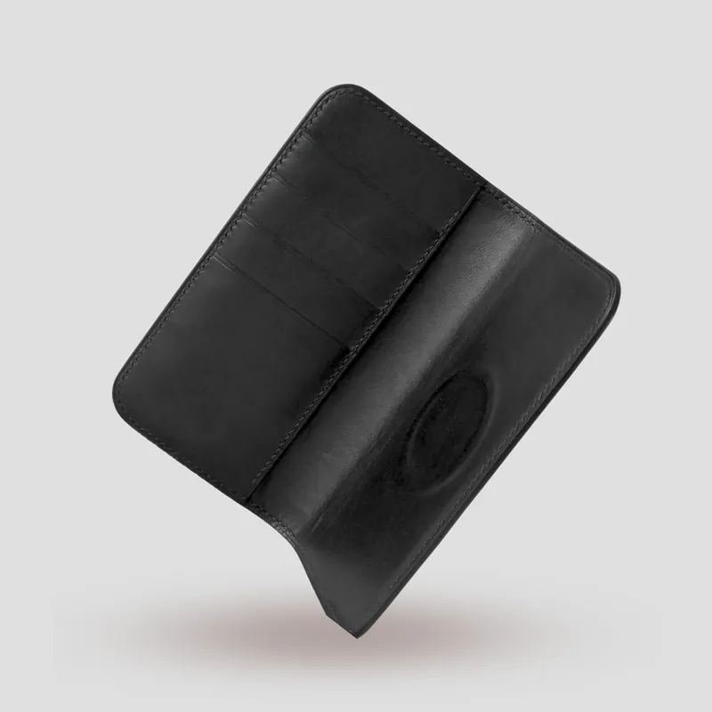 A custom iPhone Folio handcrafted in black premium Italian vegetable-tanned leather.