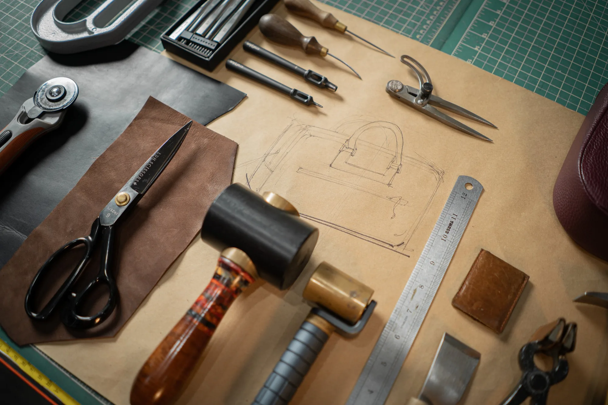 Joe's tools laid out with a pencil sketch, photographed by Dani Cruz Photography