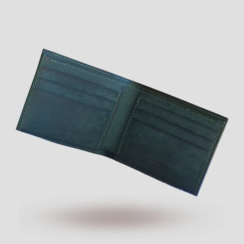 A custom wallet handcrafted in forest green premium Pueblo vegetable-tanned cowhide leather.