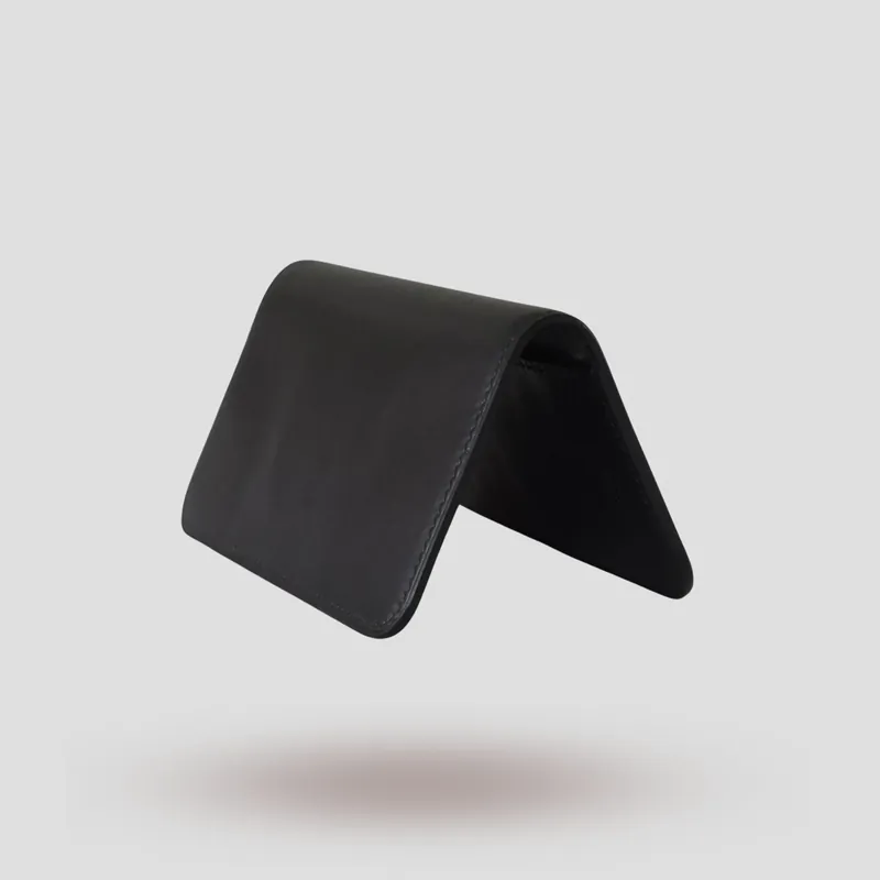 A custom iPhone Folio handcrafted in black premium Italian vegetable-tanned leather.