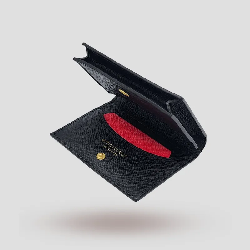 A custom wallet handcrafted in black and pink premium Epsom cowhide leather.