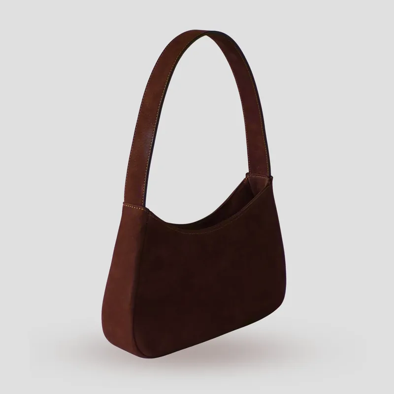 A custom shoulder bag handcrafted in dark chocolate premium Italian nubuck with a dark brown cowhide leather lining.