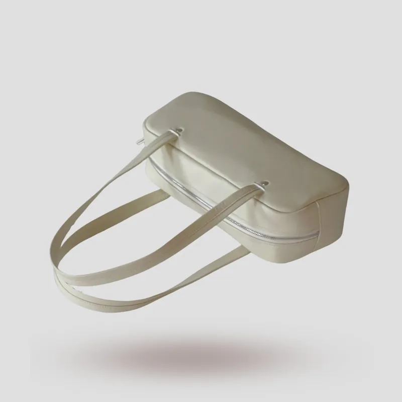 A custom shoulder bag handcrafted in off-white premium cowhide leather.