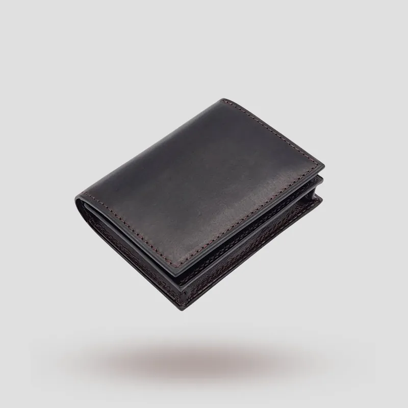A custom wallet handcrafted in dark brown premium cowhide leather.