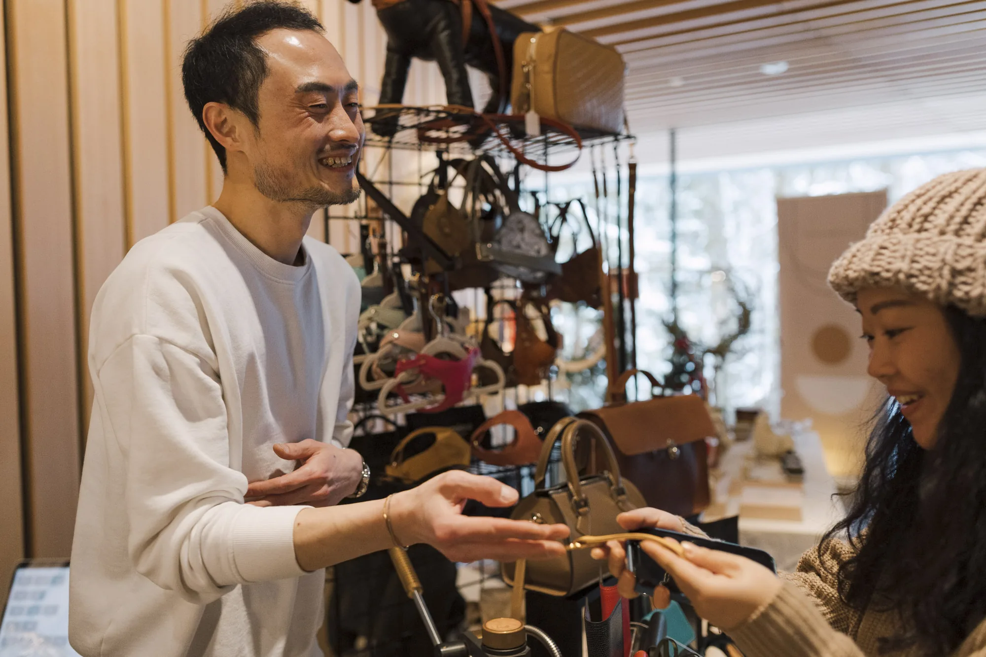 Joe with a client at the SEEK Bespoke Market in Whistler
