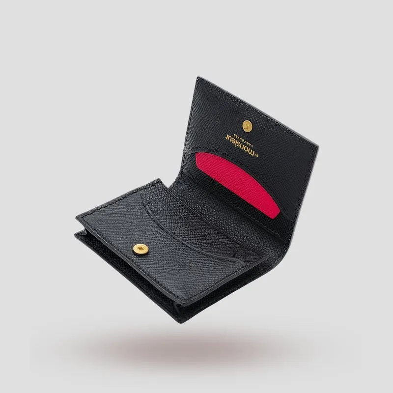 A custom wallet handcrafted in black and pink premium Epsom cowhide leather.