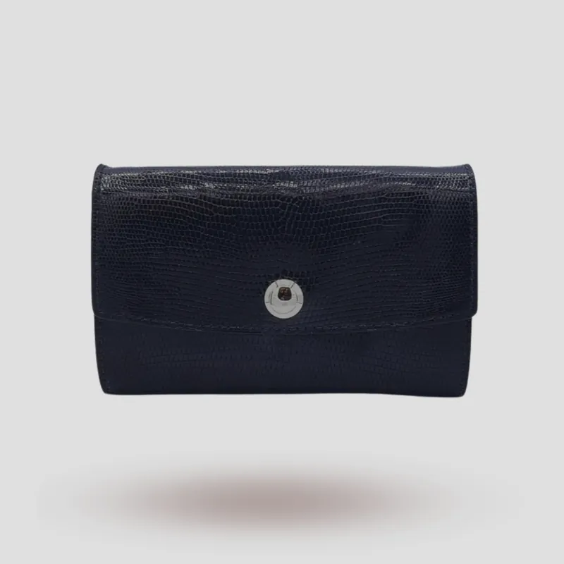 A custom clutch handcrafted in black premium lizard leather.