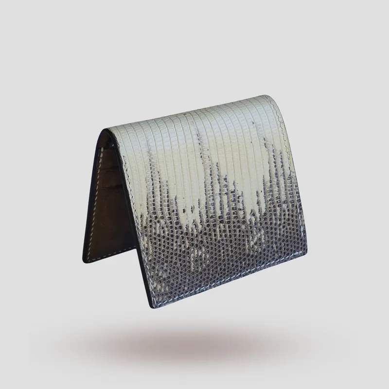 A custom wallet handcrafted in lizard skin with a beige-grey premium Pueblo vegetable-tanned cowhide leather interior.