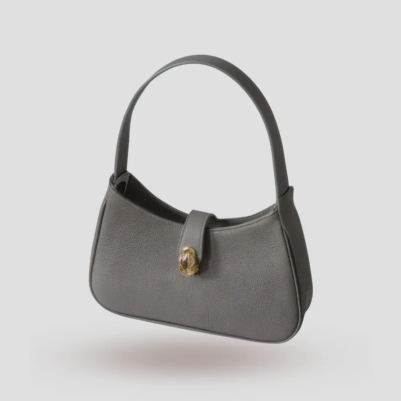 A custom shoulder bag handcrafted in grey premium cowhide leather.
