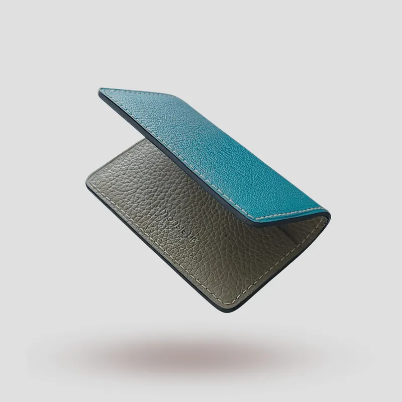 A custom wallet handcrafted in blue premium cowhide leather.