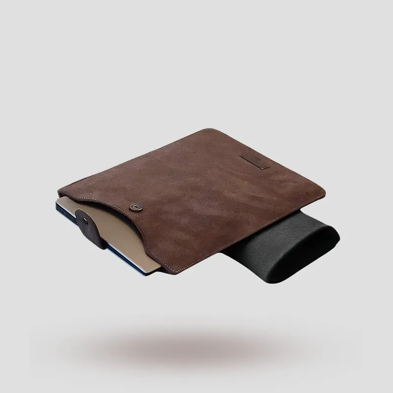 A custom laptop sleeve handcrafted in brown premium suede.