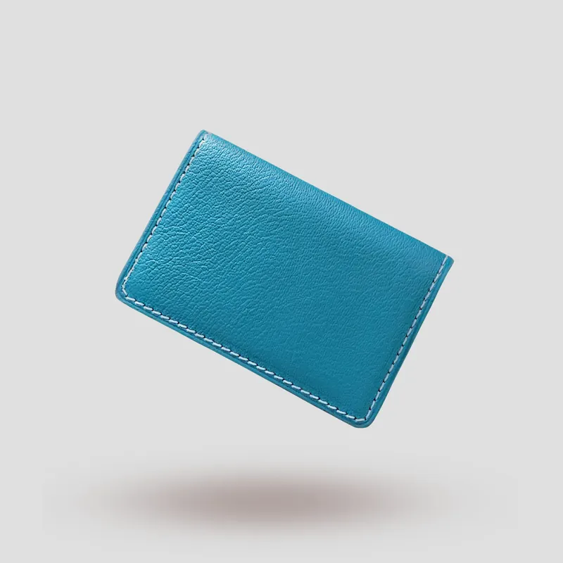 A custom wallet handcrafted in blue premium cowhide leather.