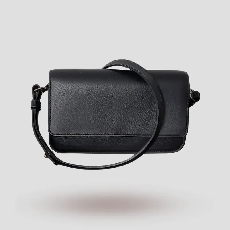 A custom pochette bag handcrafted in black premium cowhide leather.